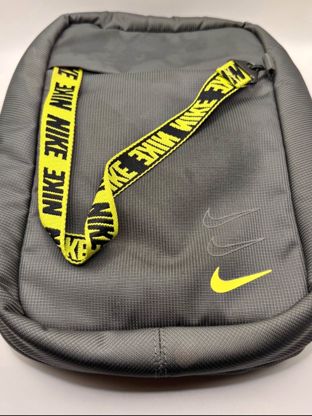 Nike Men’s Gray Crossbody Bag with Yellow Accents
